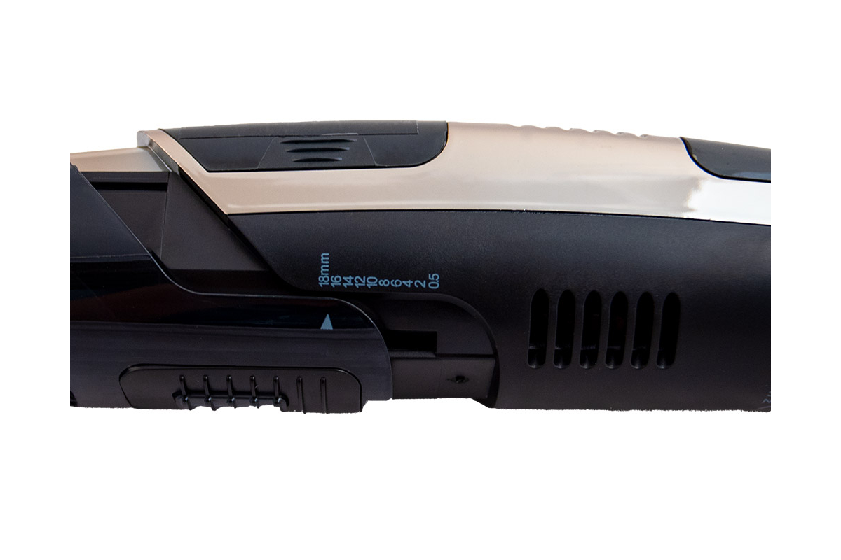 Strihací strojček s vákuovým odsávaním